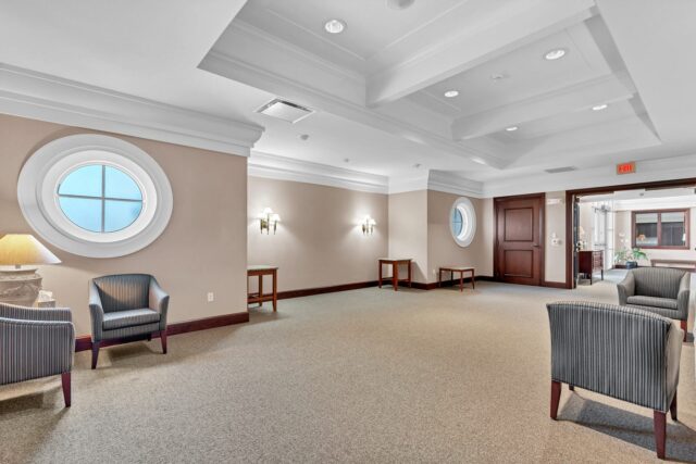 Modern chapel seating at Downing and Lahey West Wichita funeral home